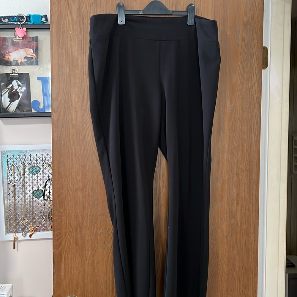 Black stretchy waste dress pants with a slight flair leg